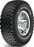 Black off-road tire with deep tread and silver rim on a white background | 106 St Tire and Wheel
