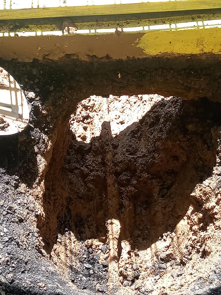 A close up of a hole in the ground