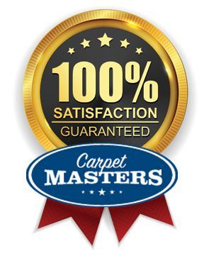 A 100 % satisfaction guaranteed carpet masters logo