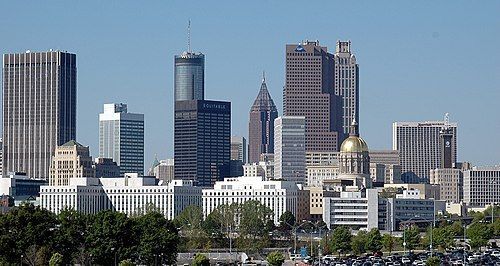A city skyline with a lot of tall buildings