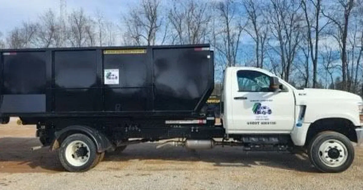 Borders Dumpsters truck delivering roll-off dumpster Bardstown KY