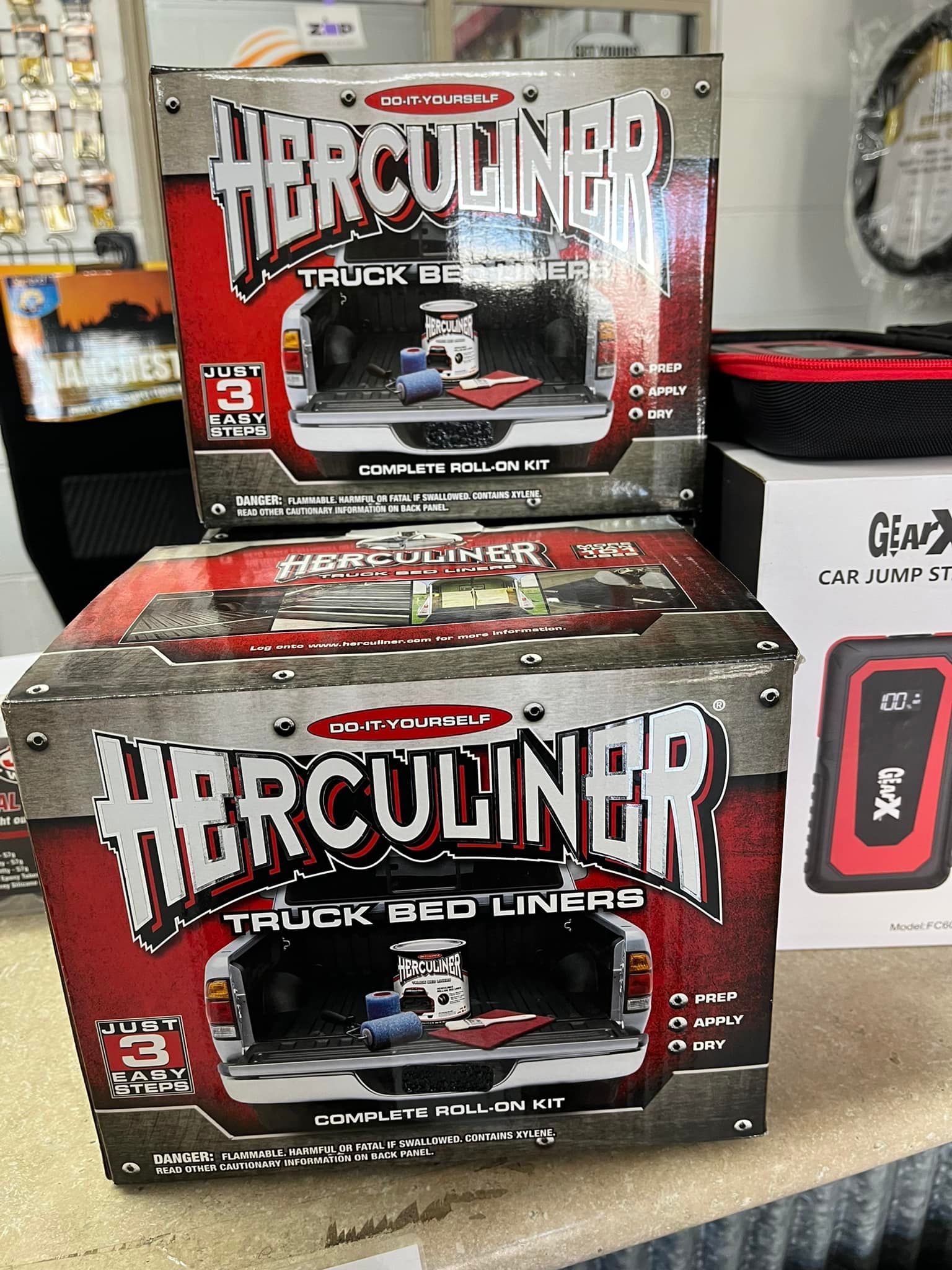 A Row Of Paper Towels Hanging On A Wall In A Cubicle — Townsville Wholesale Panel & Parts In Garbutt, QLD