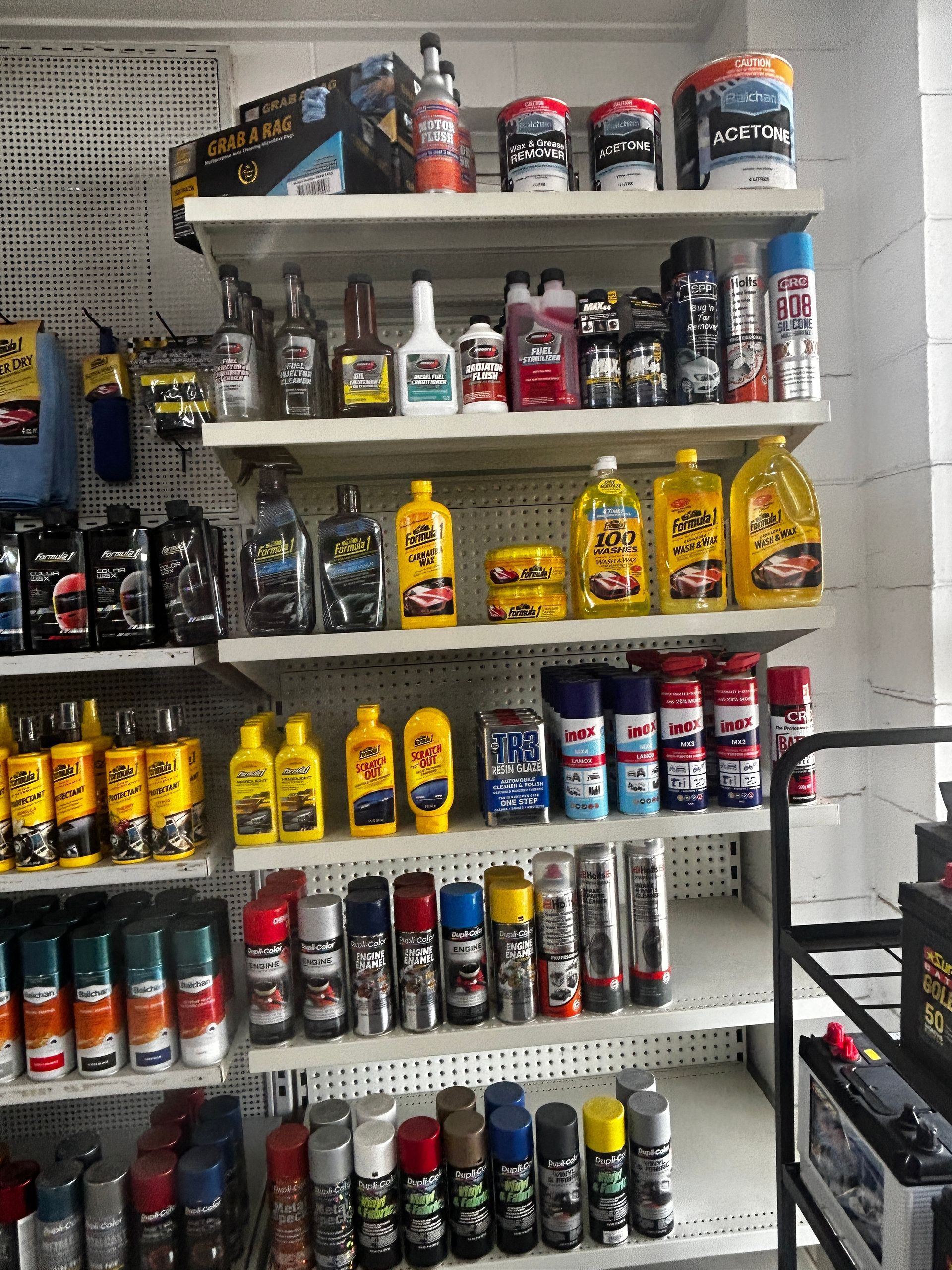 Store shelf with car products — Townsville Wholesale Panel & Parts In Garbutt, QLD