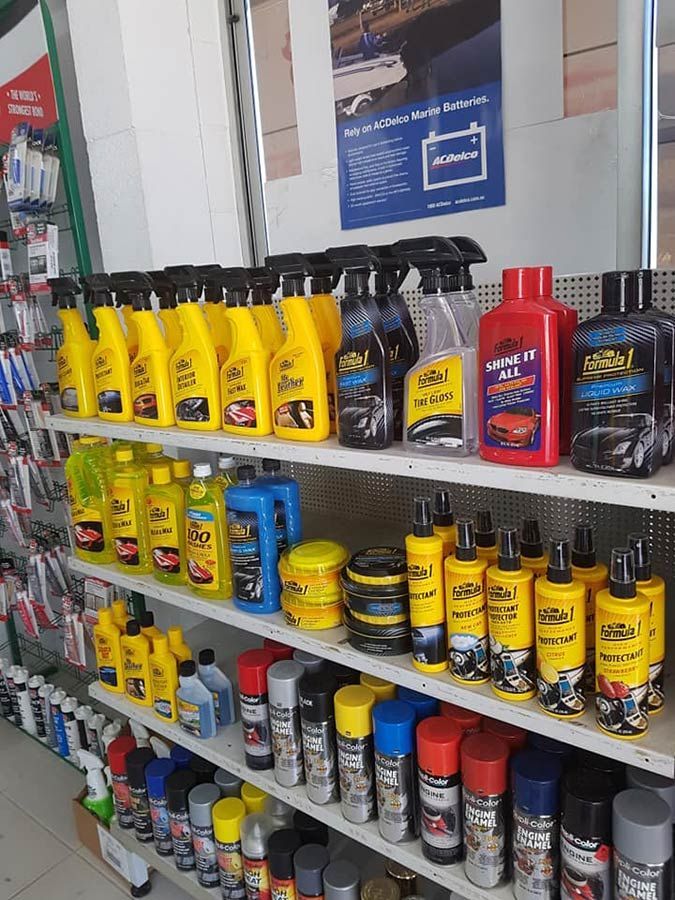 A Store Shelf Filled With a Variety of Car Cleaning Products — Townsville Wholesale Panel & Parts In Garbutt, QLD
