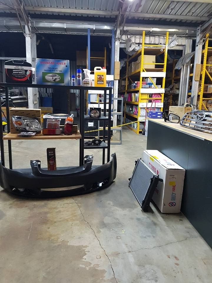 A Warehouse Filled With Lots Of Car Parts Including A Bumper — Townsville Wholesale Panel & Parts In Garbutt, QLD