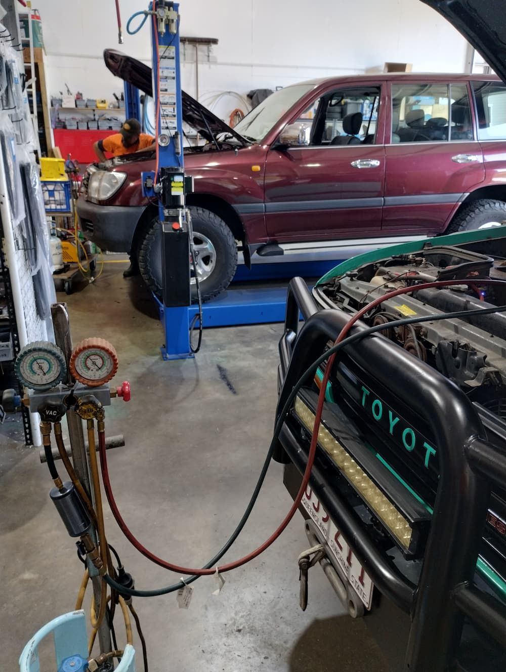A Toyota Car Is Being Worked On In A Garage — Rainbow Beach Auto Electrics In Rainbow Beach, QLD