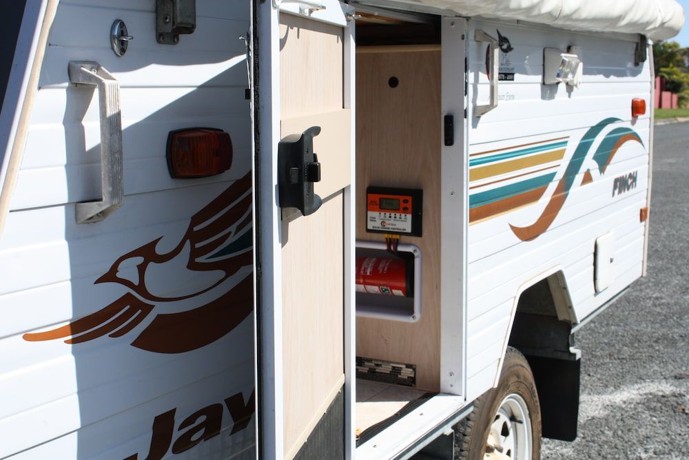 A White Jay Truck With The Door Open — Rainbow Beach Auto Electrics In Rainbow Beach, QLD