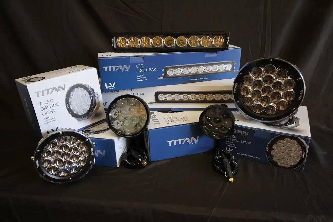 A Bunch Of Lights Are Sitting On Top Of Each Other On A Table — Rainbow Beach Auto Electrics In Rainbow Beach, QLD