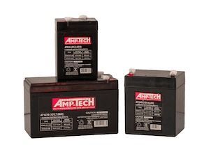 Three Batteries Are Stacked On Top Of Each Other On A White Background — Rainbow Beach Auto Electrics In Rainbow Beach, QLD