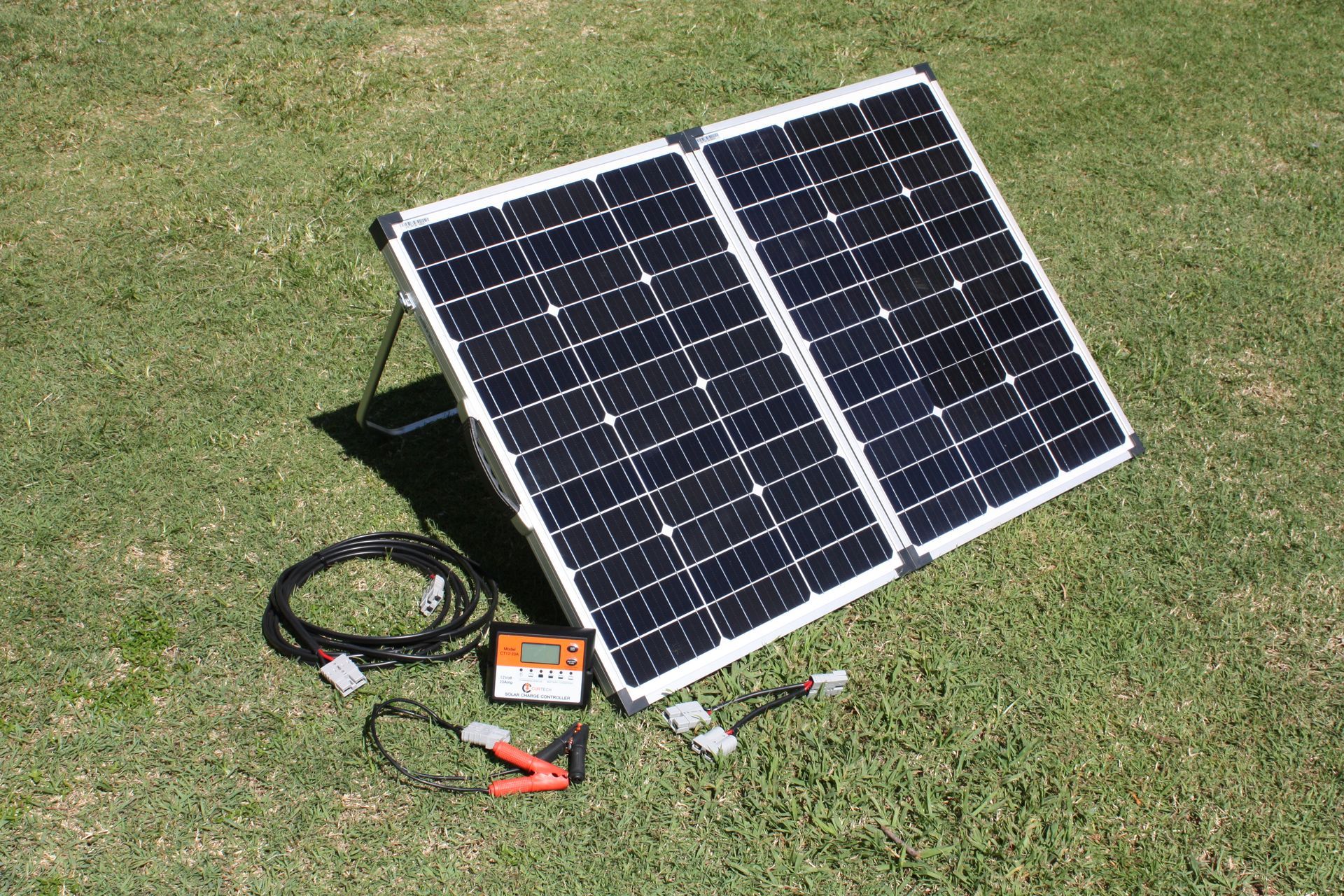 Hih Performing Solar Panel Sitting On  Grass Facing The Sun— Rainbow Beach Auto Electrics In Rainbow Beach, QLD