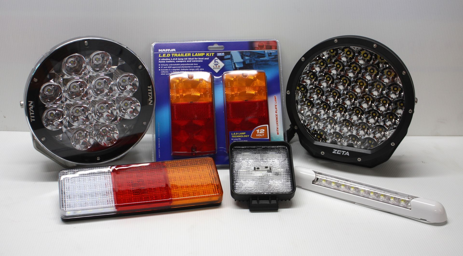 A Display Of Auto Electrical Lights On A Shelf In A Store — Rainbow Beach Auto Electrics In Rainbow Beach, QLD