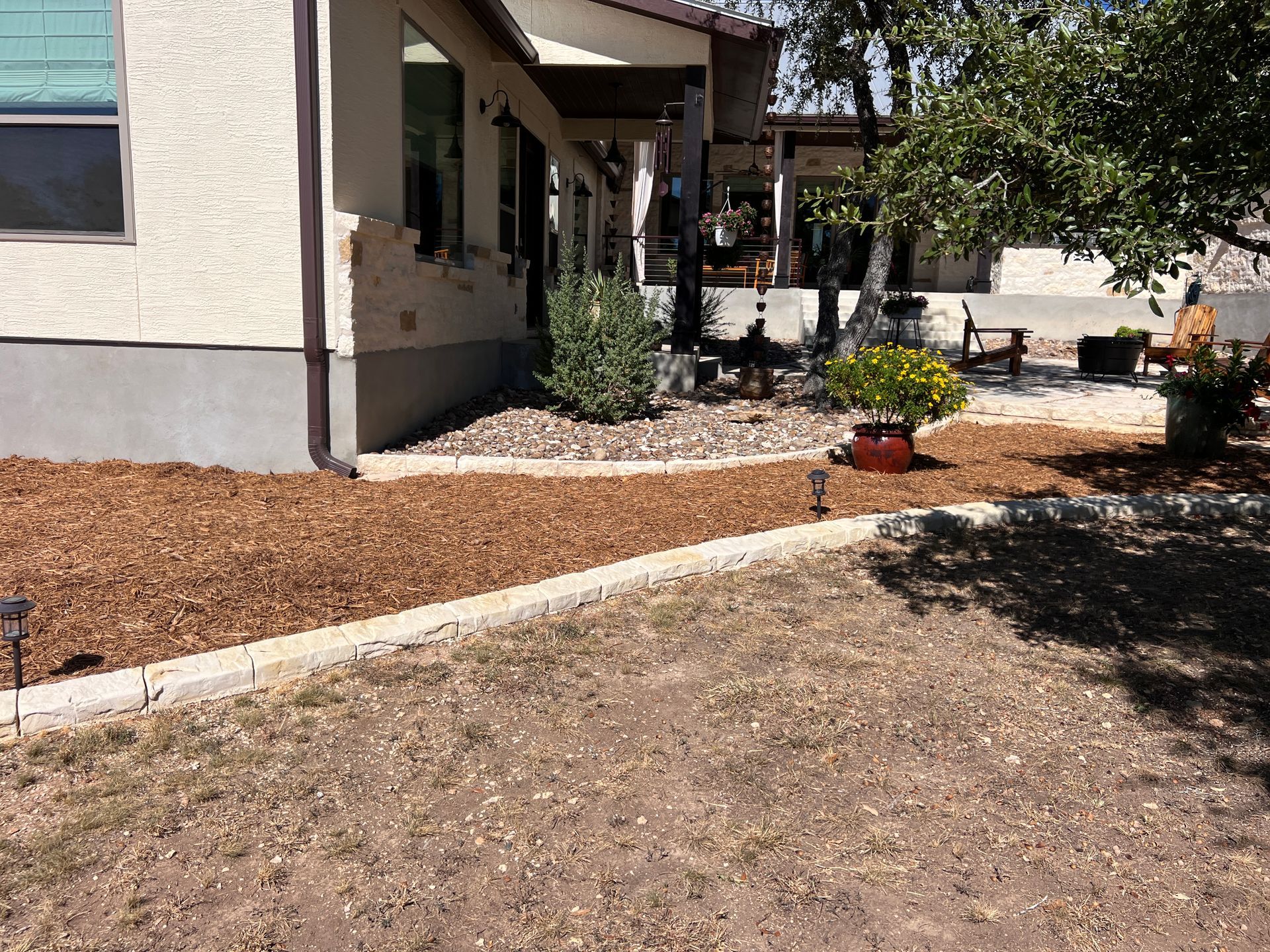 A house with a lot of dirt in front of it