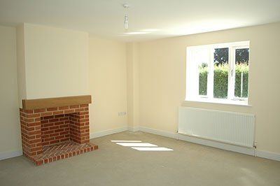 newly renovated room with fireplace