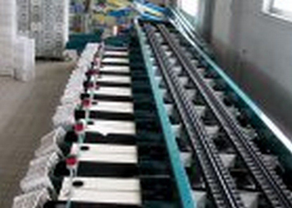 Calibratrice a rulli basculanti