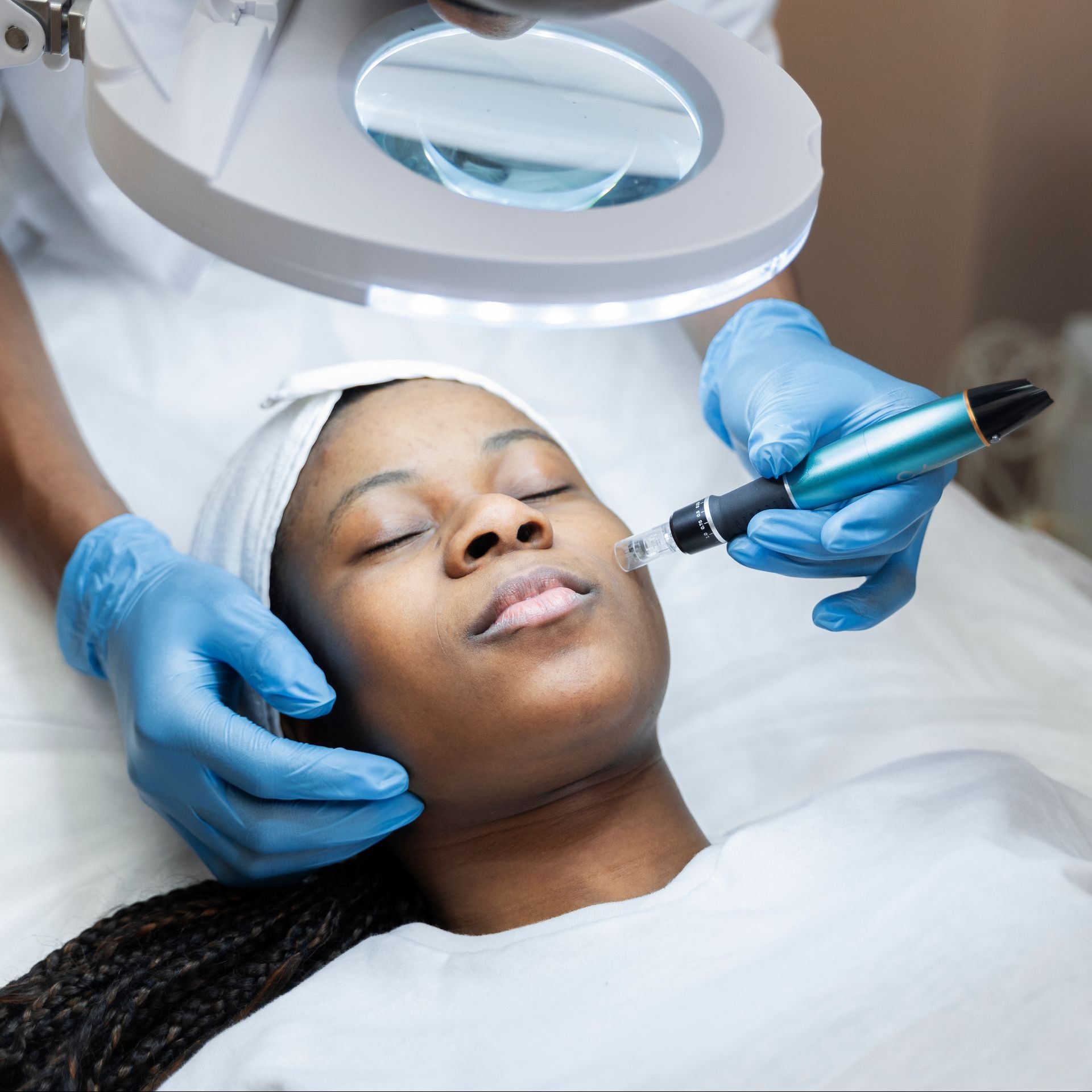 A man and a woman with black masks on their faces.