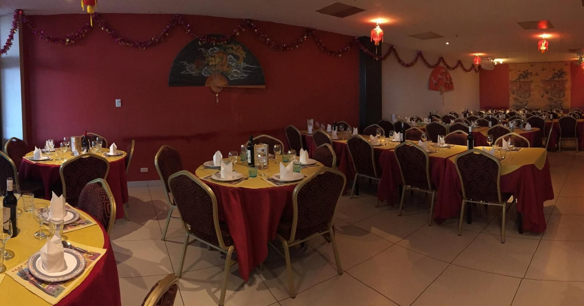 A Large Room With Tables and Chairs Set Up for a Party — Red Lantern Chinese Restaurant In Palmerston City, NT