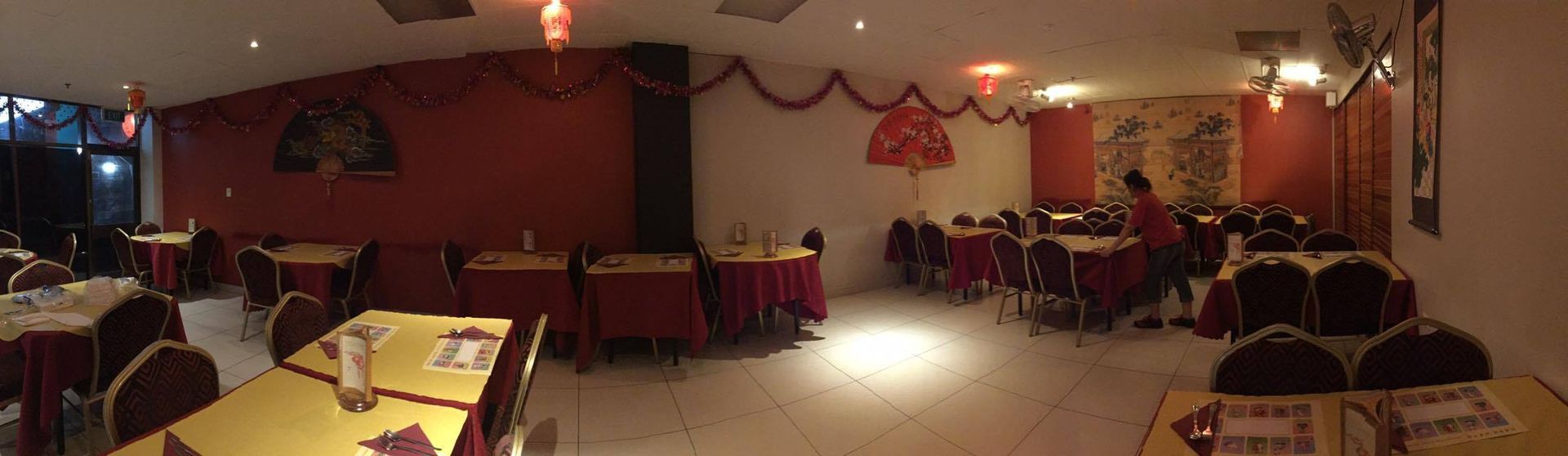A Large Dining Room With Tables and Chairs Set Up for a Party — Red Lantern Chinese Restaurant In Palmerston City, NT