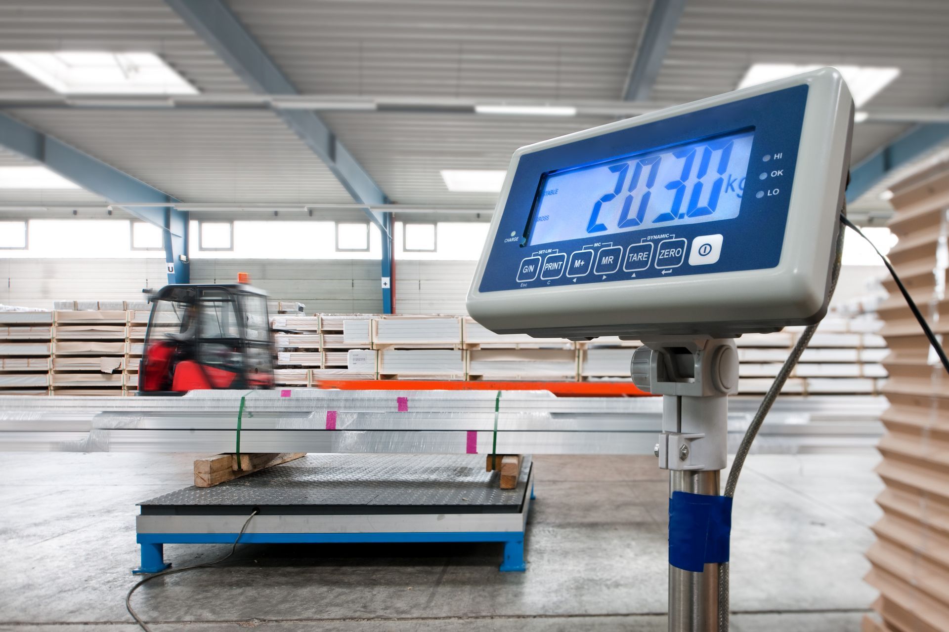 An industrial scale in a storage site after repair services.