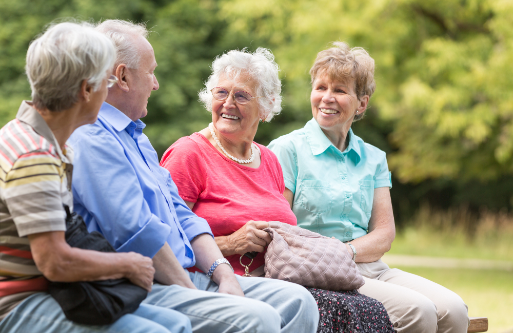 Seniors chatting in a summer day at Villa Domaine St-Grégoire a retirement home in Bécancour, Québec