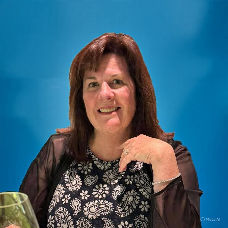 Person handing a document and passport to a person in a suit at a desk; stamps are visible.