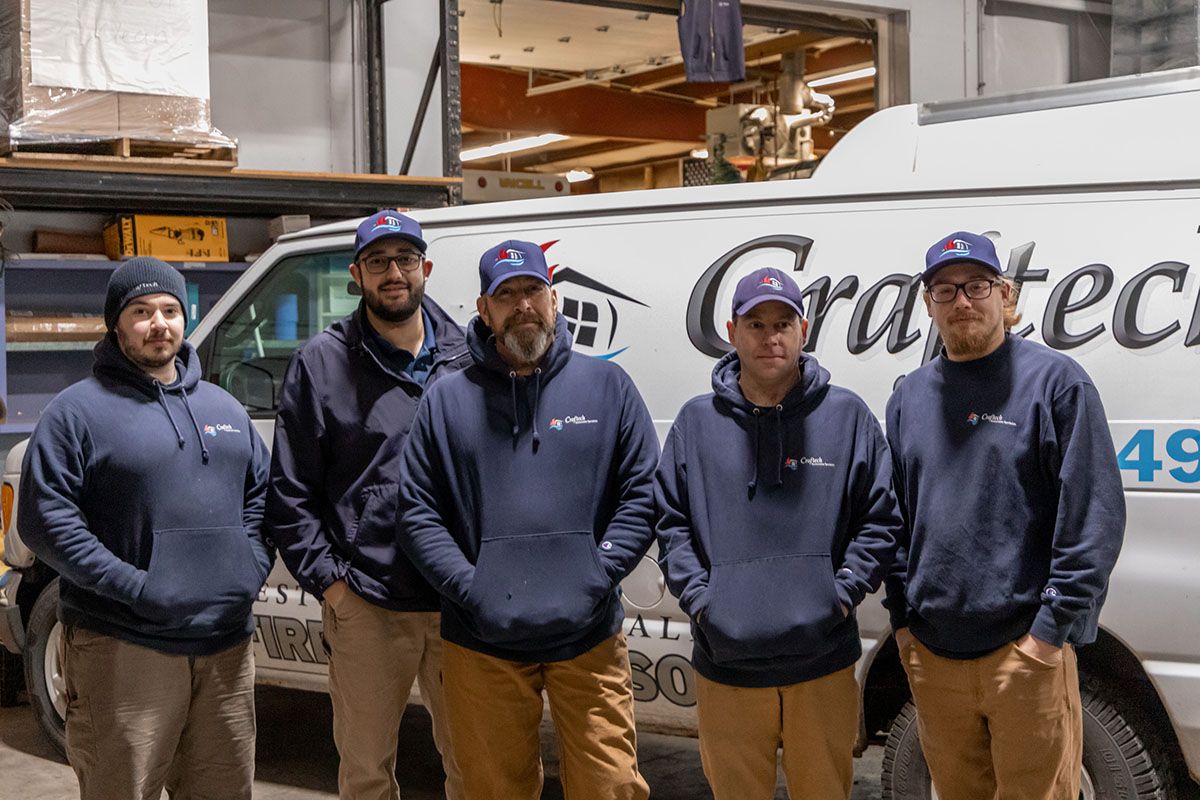 five Craftech employees together