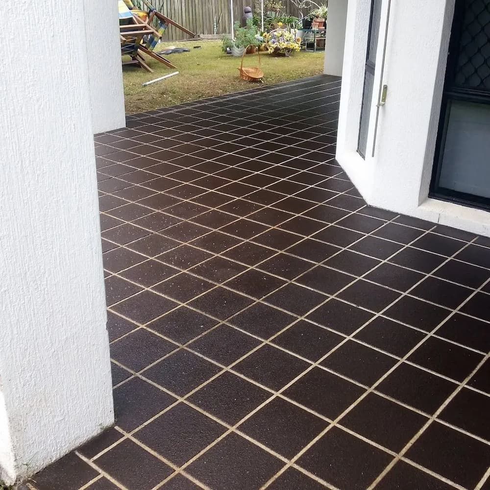 Dark brown concrete patio— Troys Concrete Overlays in Hillcrest, QLD