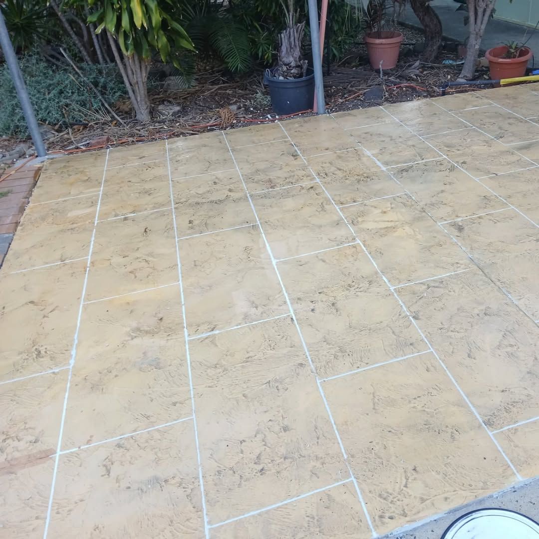 Tan-colored Concrete Patio With Rectangular Tile Pattern — Troys Concrete Overlays in Hillcrest, QLD