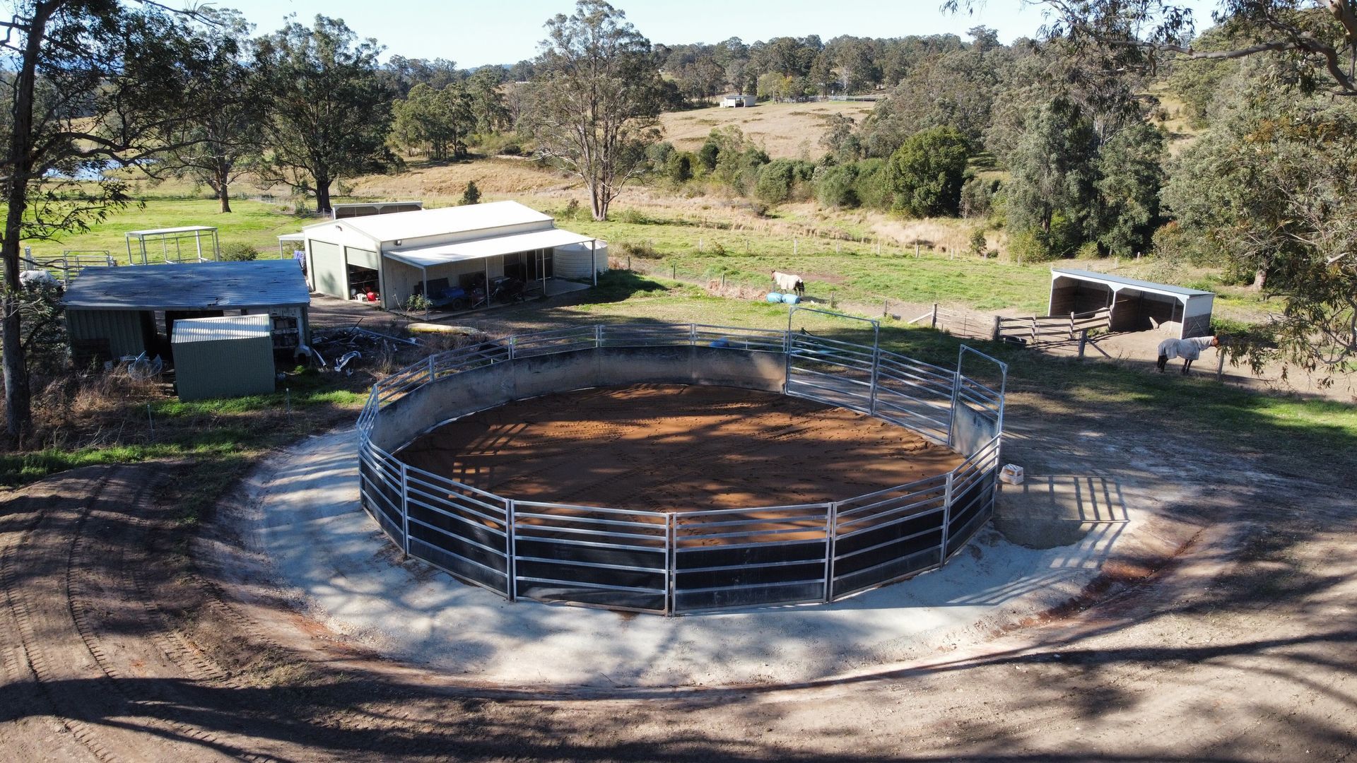 Two Bulldozers Are Digging a Hole — S M & A J Gilbert Earthmoving in Mitchells Island, NSW