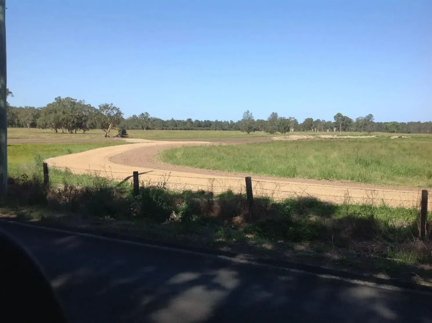 A Grassy Field With Shades — S M & A J Gilbert Earthmoving in Mitchells Island, NSW
