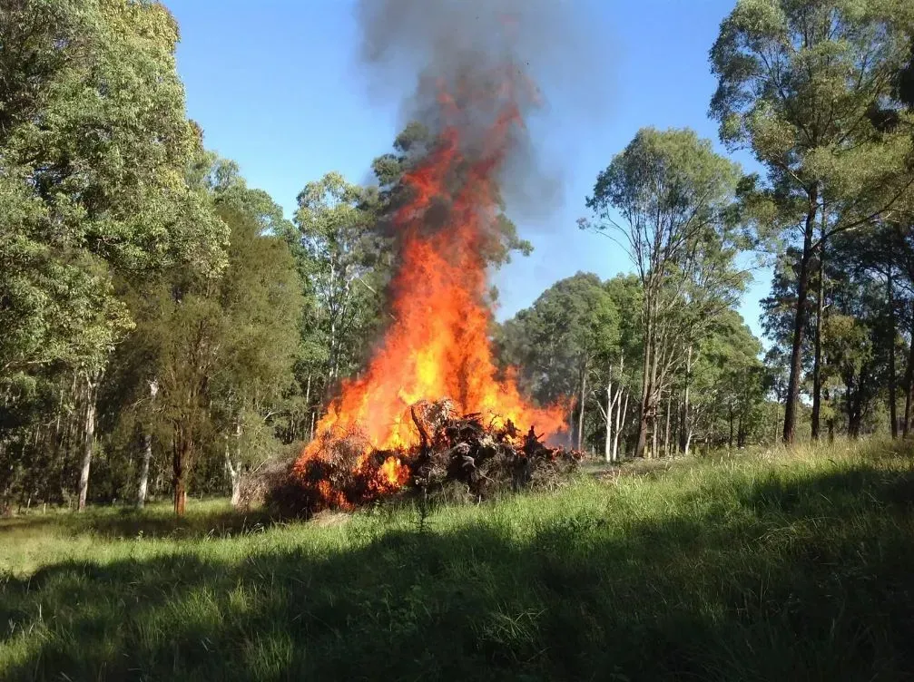 A Big Bonfire With A Lot Of Smoke — S M & A J Gilbert Earthmoving in Mitchells Island, NSW
