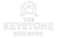 Logo for The Keystone Building, featuring an arched architectural element above the text.