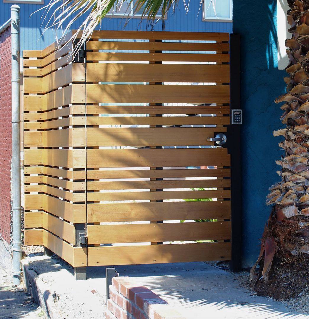 A wooden gate with the letter b on it