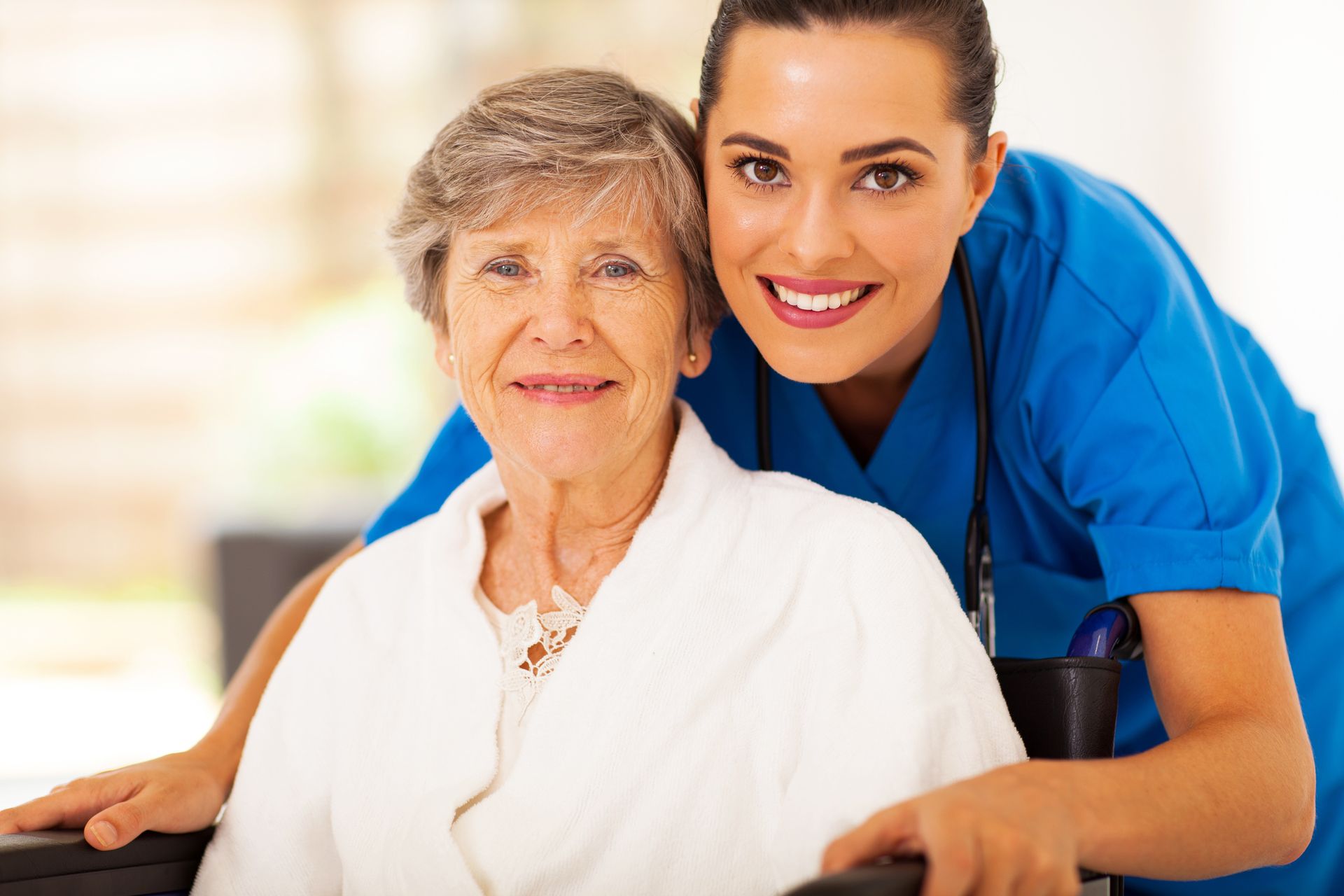 Elderly woman with caregiver highlighting support services of registered nurse home care.