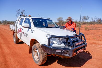 Proterra Group vehicle with man standing next to vehicle, in Regional Australia
