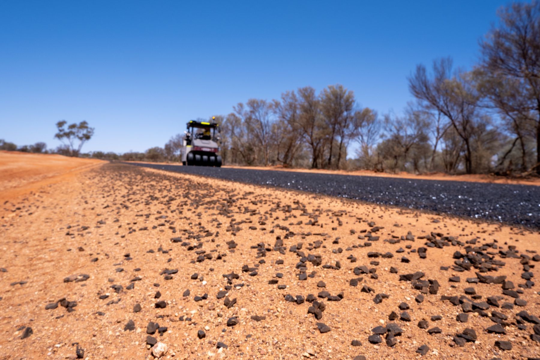 Image of machinery going over new road made by Proterra Group
