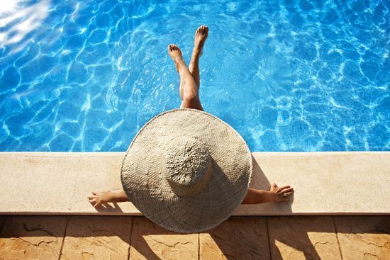 Pool — Woman Sitting in the Poolside in Cantonment, FL