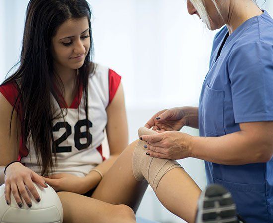 Injured Woman — Boca Raton, FL — Revitalize Sports And Rehabilitative Massage Therapy
