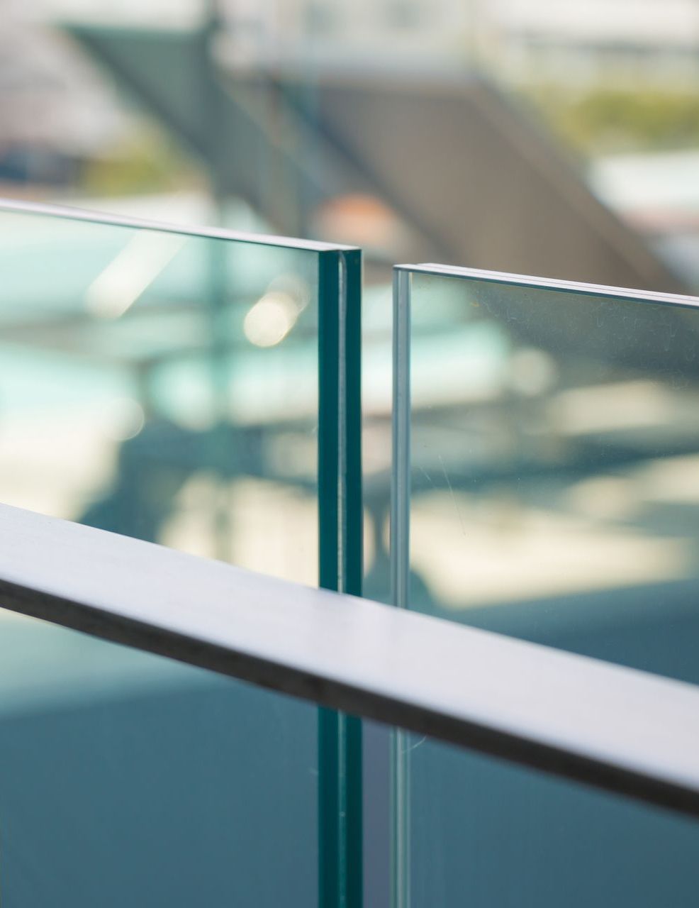 A Large Swimming Pool With A View Of The Ocean — CQ Fencing & Retaining Walls In Clinton, QLD