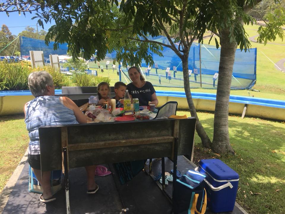 Family Enjoying the Food Under the Tree Shade — The Big Buzz Fun Park in Rainbow Flat, NSW