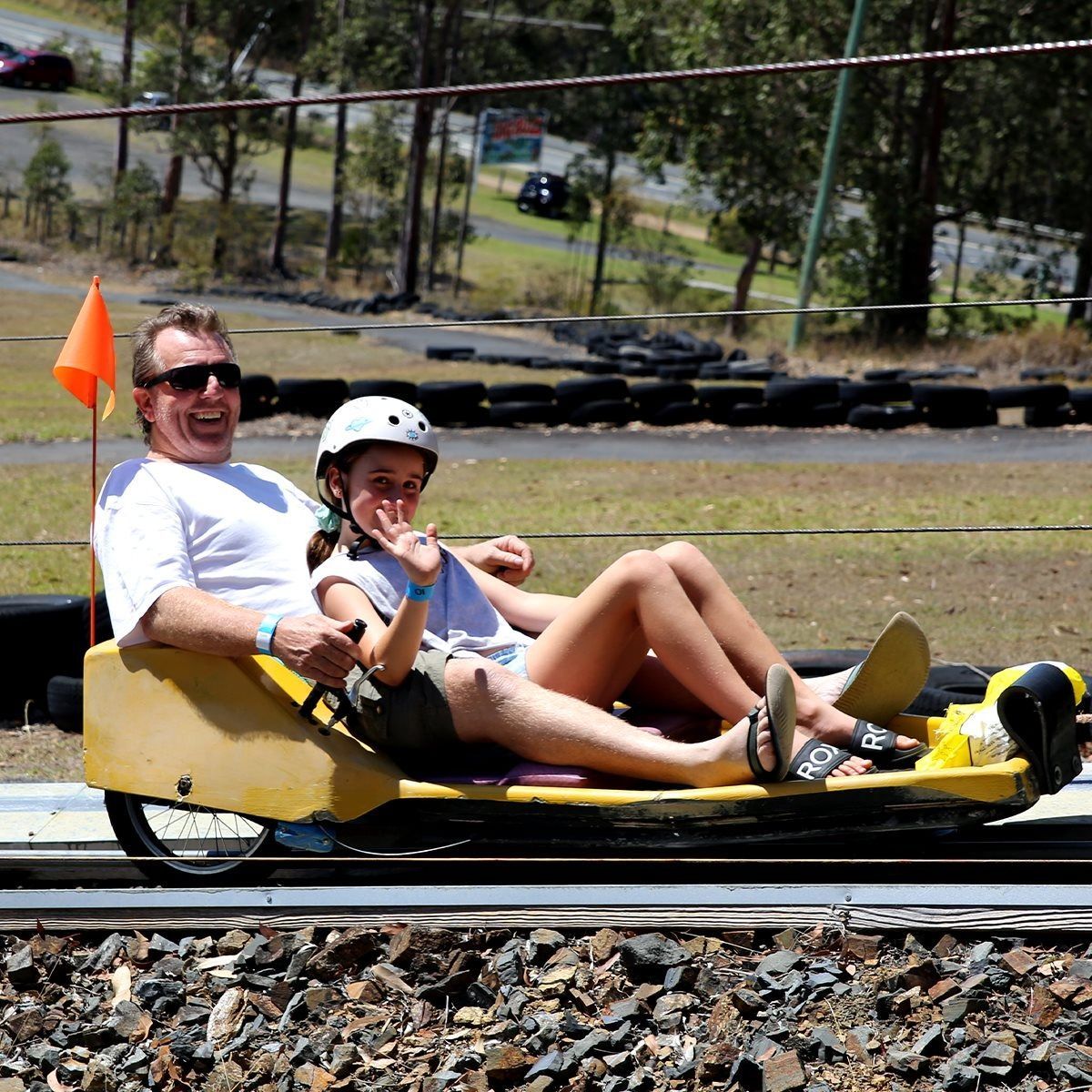 Father and Daughter in Amusement Park Ride