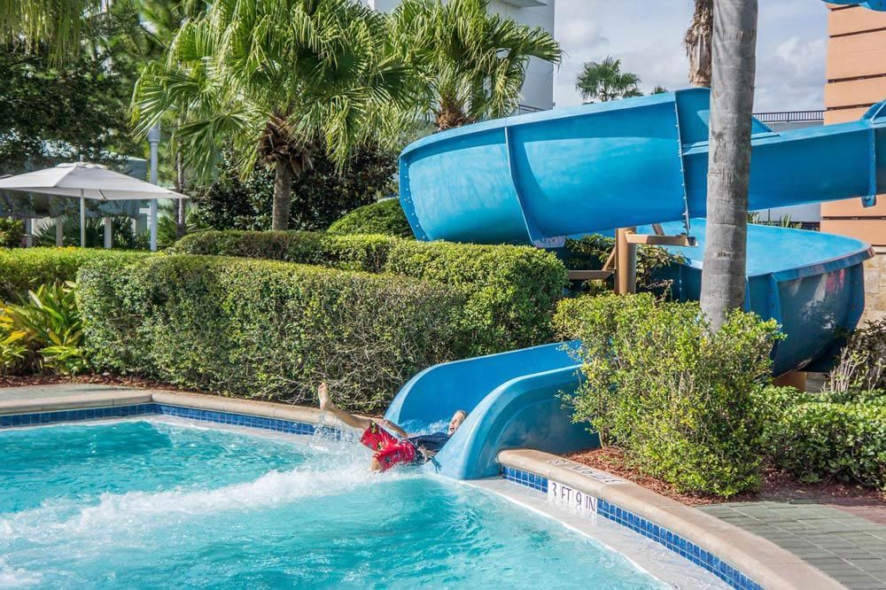 Young Boy on A Water Slide