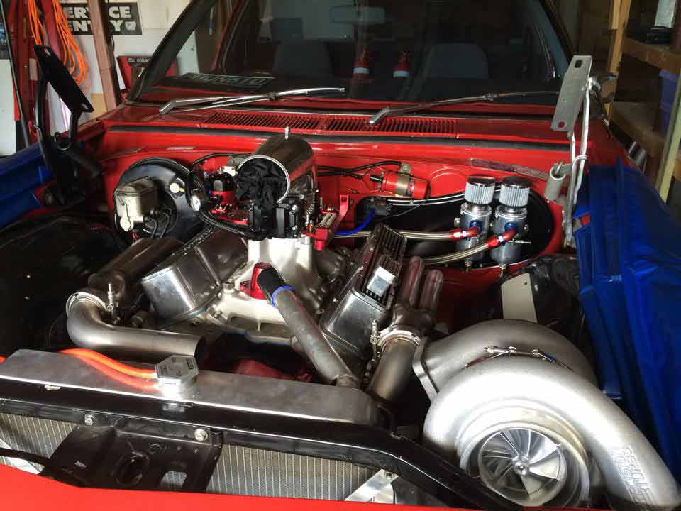 the engine of a red car