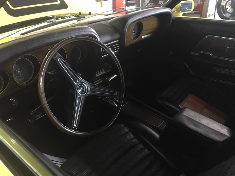 brown interior of a car with steering wheel