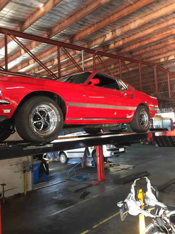 a red car on a lift