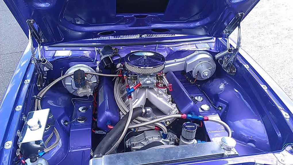 the engine of a blue car