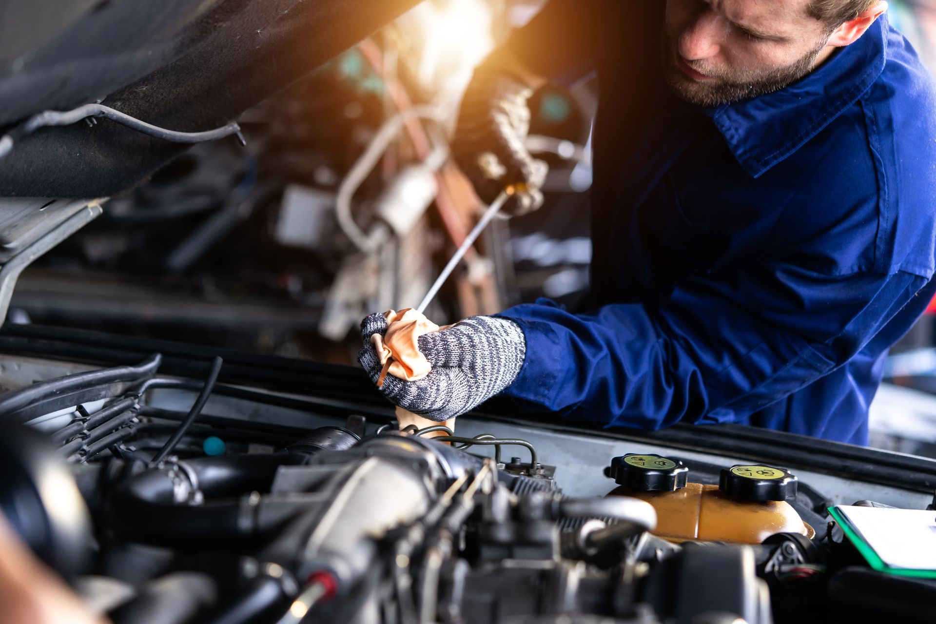 A Red Jeep Liberty Is Parked in Front of A Toyo Tire Shop | El Paso, TX | Jerry’s Auto Repair & Tire