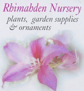 A picture of a pink flower with the words rhimadden nursery plants garden supplies and ornaments