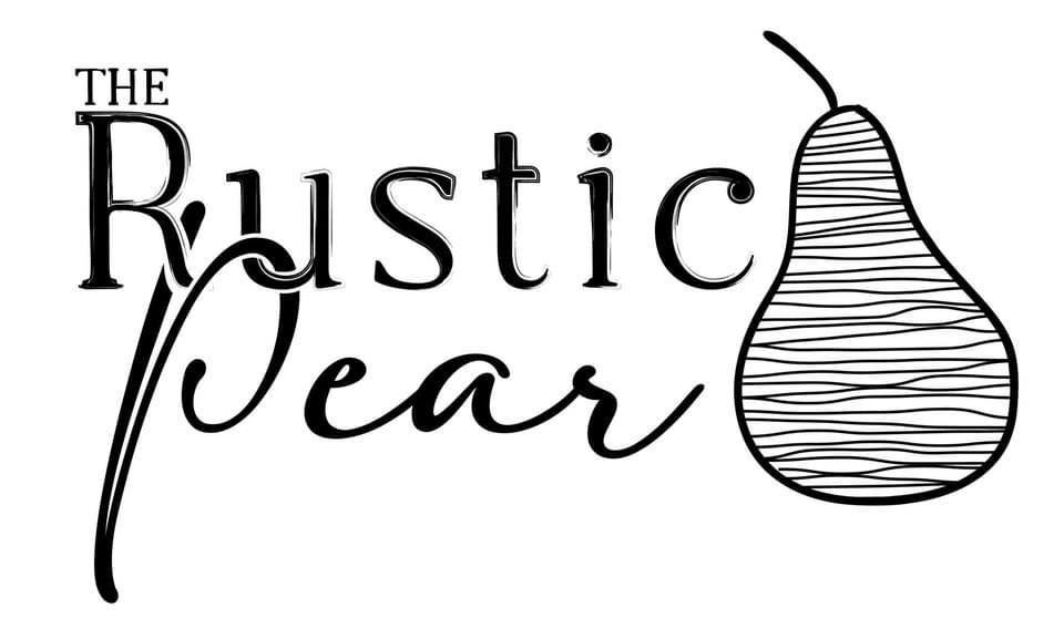 A black and white logo for the rustic pear with a pear on it.