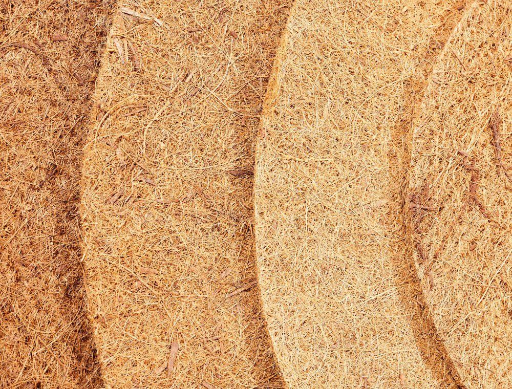 A close up of three pieces of wood stacked on top of each other.