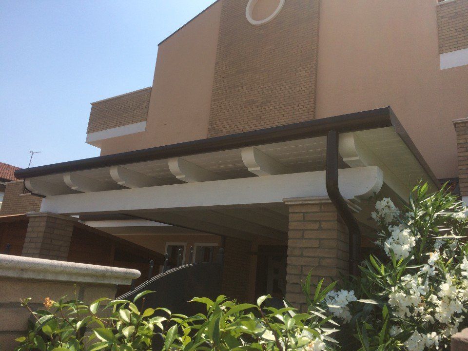 copertura con grondaia